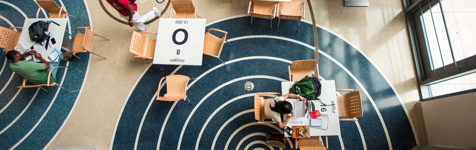 Students study in the atrium of Exploratory Hall at the Fairfax campus. Photo by Alexis Glenn/Creative Services/George Mason University