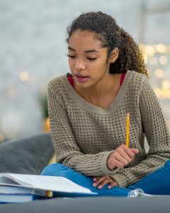 Image of student studying in their room